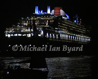 QM2 Sailing By